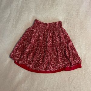 Hollister skirt, red with flower details tight at top with a minor flare,xs